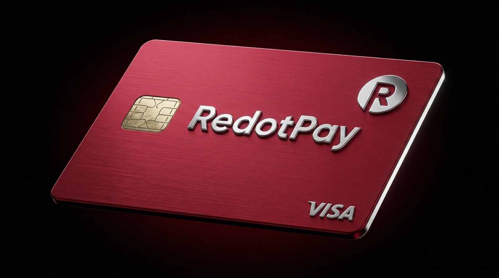 Thẻ vật lý RedotPay màu đỏ trên nền đen